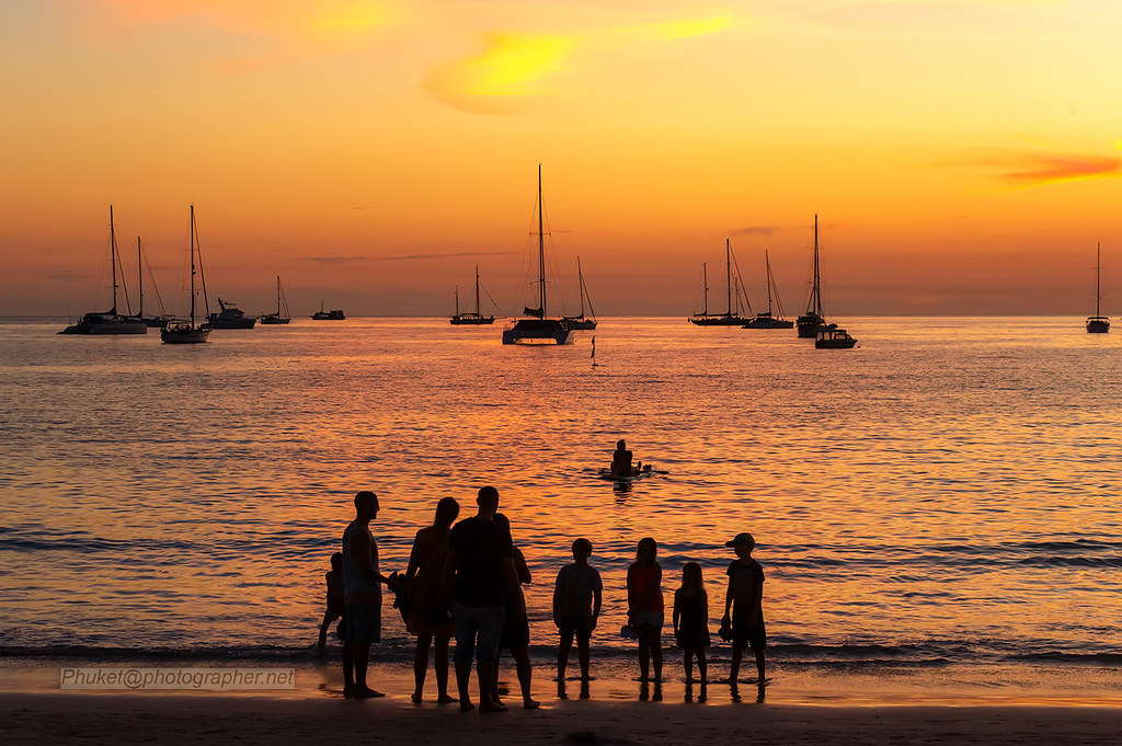 : Sunset silhouette, Nai Harn beach, Phuket island, Thailand     XOKA9923bs2