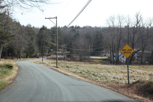 One lane bridge sign on golf course road