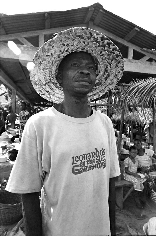 Togo West Africa Village Market Togolese Ladies close to Palimé formerly known as Kpalimé a city in Plateaux Region Togo near the Ghanaian border B&W 24 April 1999 106 Marketplace<br/>© <a href="https://flickr.com/people/41087279@N00" target="_blank" rel="nofollow">41087279@N00</a> (<a href="https://flickr.com/photo.gne?id=13948115183" target="_blank" rel="nofollow">Flickr</a>)