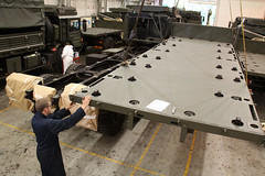 Marshall loadbed being positioned prior to installation