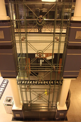 Center court elevator mirror face