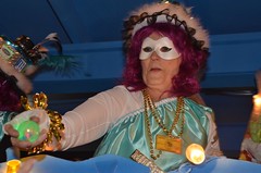 Handing Out Throws in the Krewe of Muses 2012 Parade