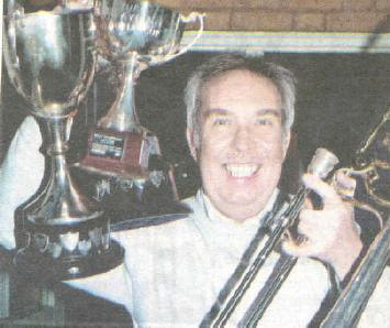 2001 : scaba contest prizes: Colin Batt receives trophys for Best Trombone Section & 3rd Place for contest piece