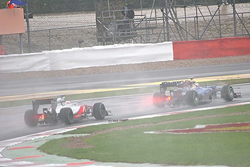 Jenson Button catches Jean-Eric Vergne at Silverstone