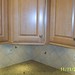 4" square tile with accents over a granite counter.  The cabinets also have light molding added under them. • <a style="font-size:0.8em;" href="http://www.flickr.com/photos/78662665@N03/6896558970/" target="_blank">View on Flickr</a>
