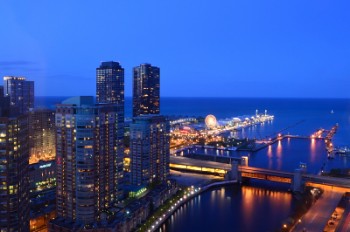 Chicago Cityfront with Lake Michigan & Chicago Lighthouse & River at dusk