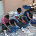 Students Cleaning Pottery • <a style="font-size:0.8em;" href="http://www.flickr.com/photos/72440139@N06/6835783729/" target="_blank">View on Flickr</a>