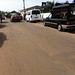 Cars parked outside Poliklinic Labadi, Accra.