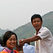 Tujia boatman and girl sing to passengers - Shennong Stream, China