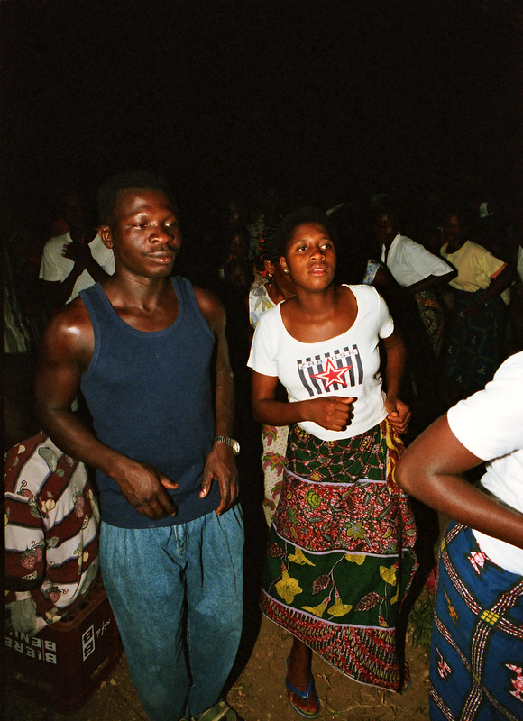 Togo West Africa Ethnic Cultural Dancing and Drumming African Village close to Palimé formerly known as Kpalimé a city in Plateaux Region Togo near the Ghanaian border 24 April 1999 170<br/>© <a href="https://flickr.com/people/41087279@N00" target="_blank" rel="nofollow">41087279@N00</a> (<a href="https://flickr.com/photo.gne?id=14036365583" target="_blank" rel="nofollow">Flickr</a>)