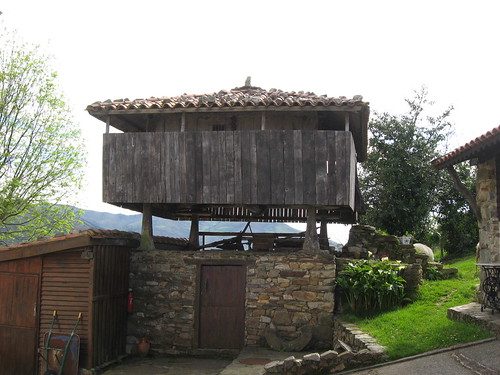 45. Cottage. Horreo grain silos, raised on stilts so as to keep field mice from getting at the gr