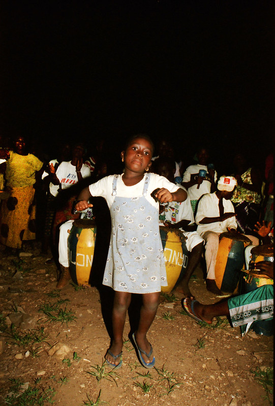 Togo West Africa Ethnic Cultural Dancing and Drumming African Village close to Palimé formerly known as Kpalimé a city in Plateaux Region Togo near the Ghanaian border 24 April 1999 144 Drumming<br/>© <a href="https://flickr.com/people/41087279@N00" target="_blank" rel="nofollow">41087279@N00</a> (<a href="https://flickr.com/photo.gne?id=13987572125" target="_blank" rel="nofollow">Flickr</a>)