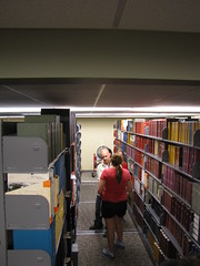 Staff and students shelving • <a style="font-size:0.8em;" href="http://www.flickr.com/photos/22626693@N04/7251221252/" target="_blank">View on Flickr</a>