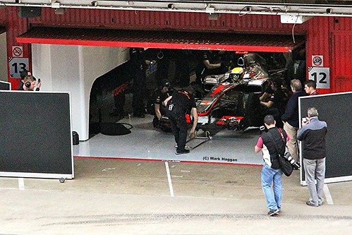 Lewis Hamilton prepares to come out of the garage in his McLaren at Formula One Winter Testing, Circuit de Catalunya, March 2012