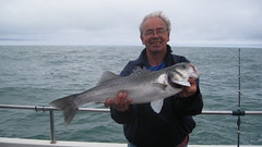 Howard Finch with his 8lb 6 oz Bass • <a style="font-size:0.8em;" href="http://www.flickr.com/photos/113772263@N05/28030275026/" target="_blank">View on Flickr</a>