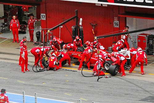 The Ferrari team practice a pit stop for Fernando Alonso at Formula One Winter Testing, Circuit de Catalunya, March 2012
