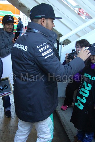Lewis Hamilton signs autographs for some young fans at Formula One Winter Testing 2015