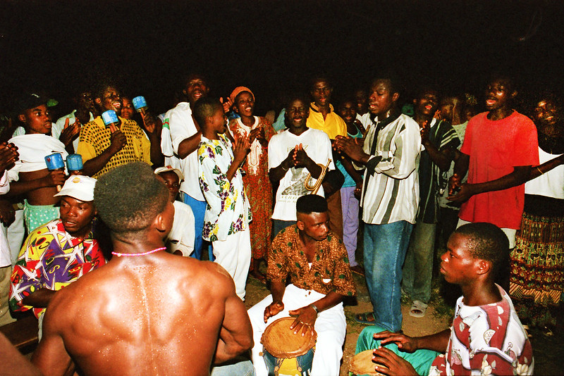 Togo West Africa Ethnic Cultural Dancing and Drumming African Village close to Palimé formerly known as Kpalimé a city in Plateaux Region Togo near the Ghanaian border 24 April 1999 162<br/>© <a href="https://flickr.com/people/41087279@N00" target="_blank" rel="nofollow">41087279@N00</a> (<a href="https://flickr.com/photo.gne?id=14016824494" target="_blank" rel="nofollow">Flickr</a>)