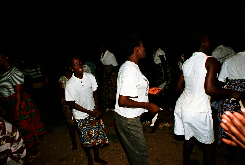Togo West Africa Ethnic Cultural Dancing and Drumming African Village close to Palimé formerly known as Kpalimé a city in Plateaux Region Togo near the Ghanaian border 24 April 1999 131 Drumming<br/>© <a href="https://flickr.com/people/41087279@N00" target="_blank" rel="nofollow">41087279@N00</a> (<a href="https://flickr.com/photo.gne?id=13984409091" target="_blank" rel="nofollow">Flickr</a>)