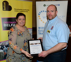 Worldhost participant John Doherty (on behalf of Four Star Pizza, Lisburn Road) pictured with Councillor Deirdre Hargey
