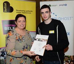 Worldhost participant Mark Teegan (on behalf of Daniel Hutchinson) pictured with Councillor Deirdre Hargey