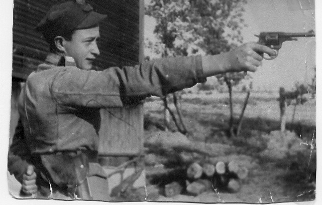 Dad with pistol, near Warsaw 1944