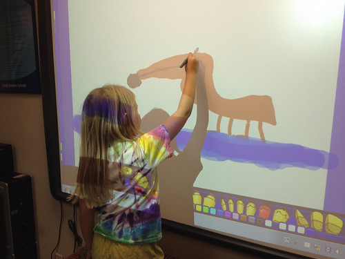 Nora makes a picture of Webster on an Activboard. • <a style="font-size:0.8em;" href="http://www.flickr.com/photos/96277117@N00/10863326783/" target="_blank">View on Flickr</a>