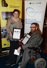 Worldhost participant Greens Pizza Lisburn Road and Café Conor pictured with Councillor Deirdre Hargey