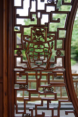 Sun Yat Sen Gardens - door detail - philosopher hat • <a style="font-size:0.8em;" href="http://www.flickr.com/photos/30765416@N06/9231156879/" target="_blank">View on Flickr</a>
