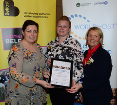 Worldhost participants Gillian Clarke and Pamela Millar (on behalf of Knead Street Deli by Sodexo) pictured with Councillor Deirdre Hargey