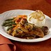 Seared Chicken Breast prepared with a Sweet Brown Marsala Sauce and Mushrooms.

