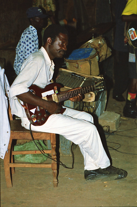 Togo West Africa Local Ethnic Cultural Orchestra Band and Show African Village close to Palimé formerly known as Kpalimé a city in Plateaux Region Togo near the Ghanaian border 23 April 1999 113<br/>© <a href="https://flickr.com/people/41087279@N00" target="_blank" rel="nofollow">41087279@N00</a> (<a href="https://flickr.com/photo.gne?id=13980329444" target="_blank" rel="nofollow">Flickr</a>)