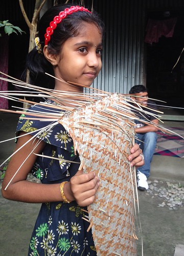 Eleven year old artist designing Sitalpati mats...