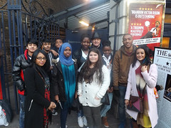 Journey to Justice group outside the Garrick Theatre with members of the cast