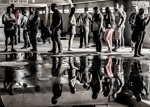Reflections of people in water