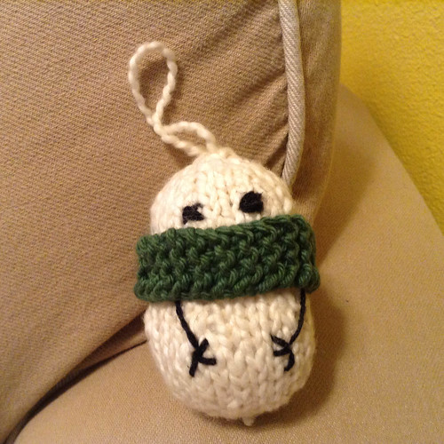 A little snowman that Crystal knitted for her secret santa. • <a style="font-size:0.8em;" href="http://www.flickr.com/photos/96277117@N00/15838878748/" target="_blank">View on Flickr</a>