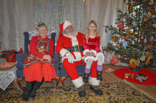 Nora with Mr. and Mrs. Claus • <a style="font-size:0.8em;" href="http://www.flickr.com/photos/96277117@N00/15404056144/" target="_blank">View on Flickr</a>