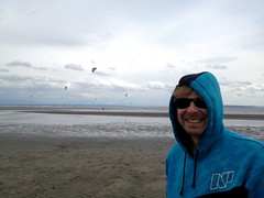 Andrew heading out to kite surf in the frigid waters of Boundary Bay.