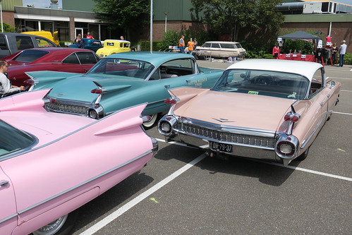 three 1959 Cadillacs