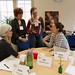 One of several small group discussions; despite the name cards, here's who is pictured (l to r): Jill Allen, Pam Paulson, Bev Bernbaum, Mary Wesley (photo by Doug Plummer)