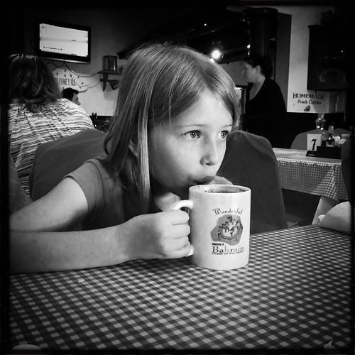 Nora sips hot chocolate at Ric's Country Kitchen.  We don't get there often but it is arguably the best greasy spoon diner on the island. • <a style="font-size:0.8em;" href="http://www.flickr.com/photos/96277117@N00/18217522959/" target="_blank">View on Flickr</a>
