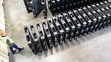 Knocking Over 1,377 Large Plastic Shipping Pallets Like Dominos